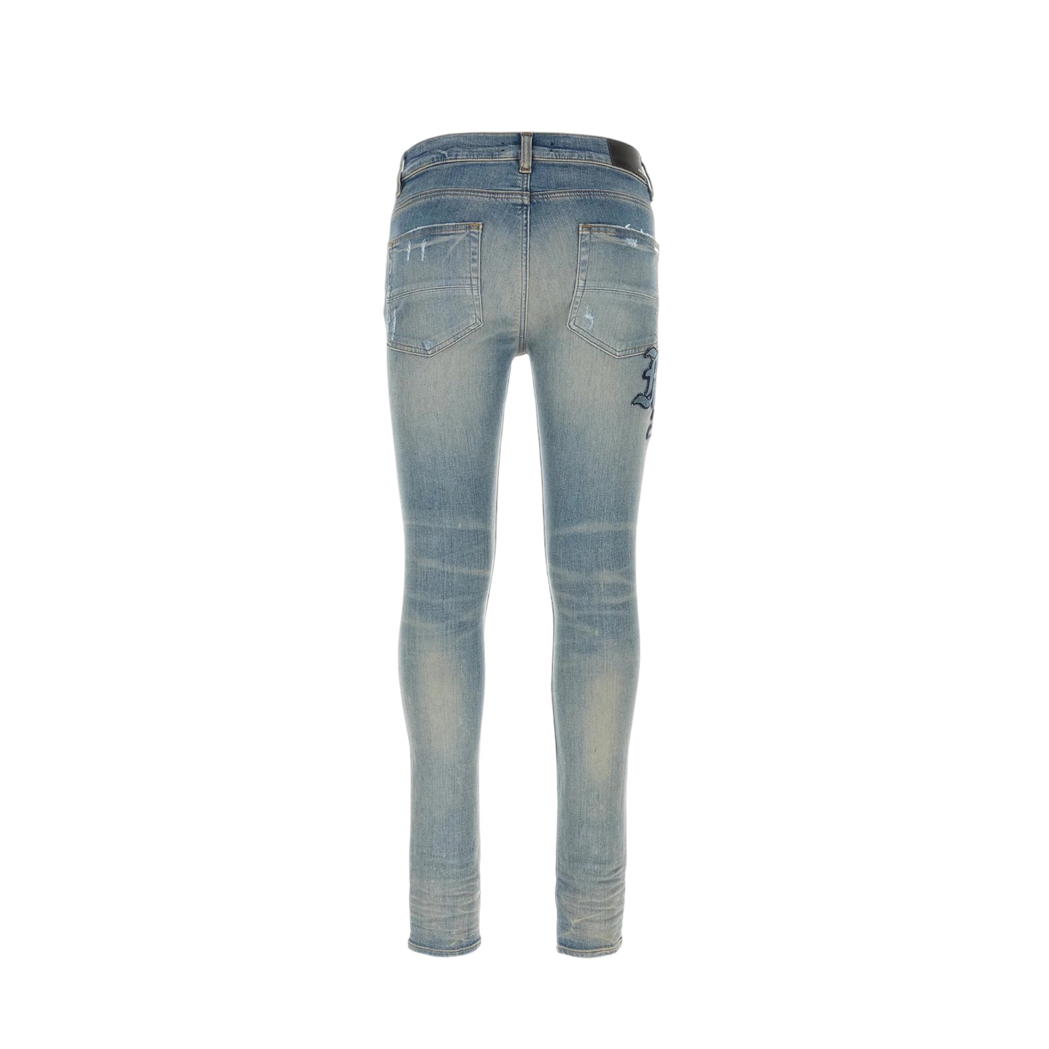 Amiri Faded Effect Distressed Skinny Jeans